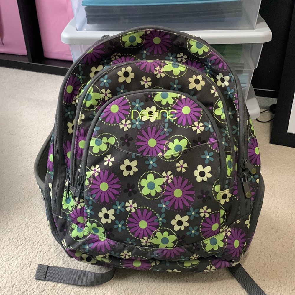 DaKine girls purple floral backpack.